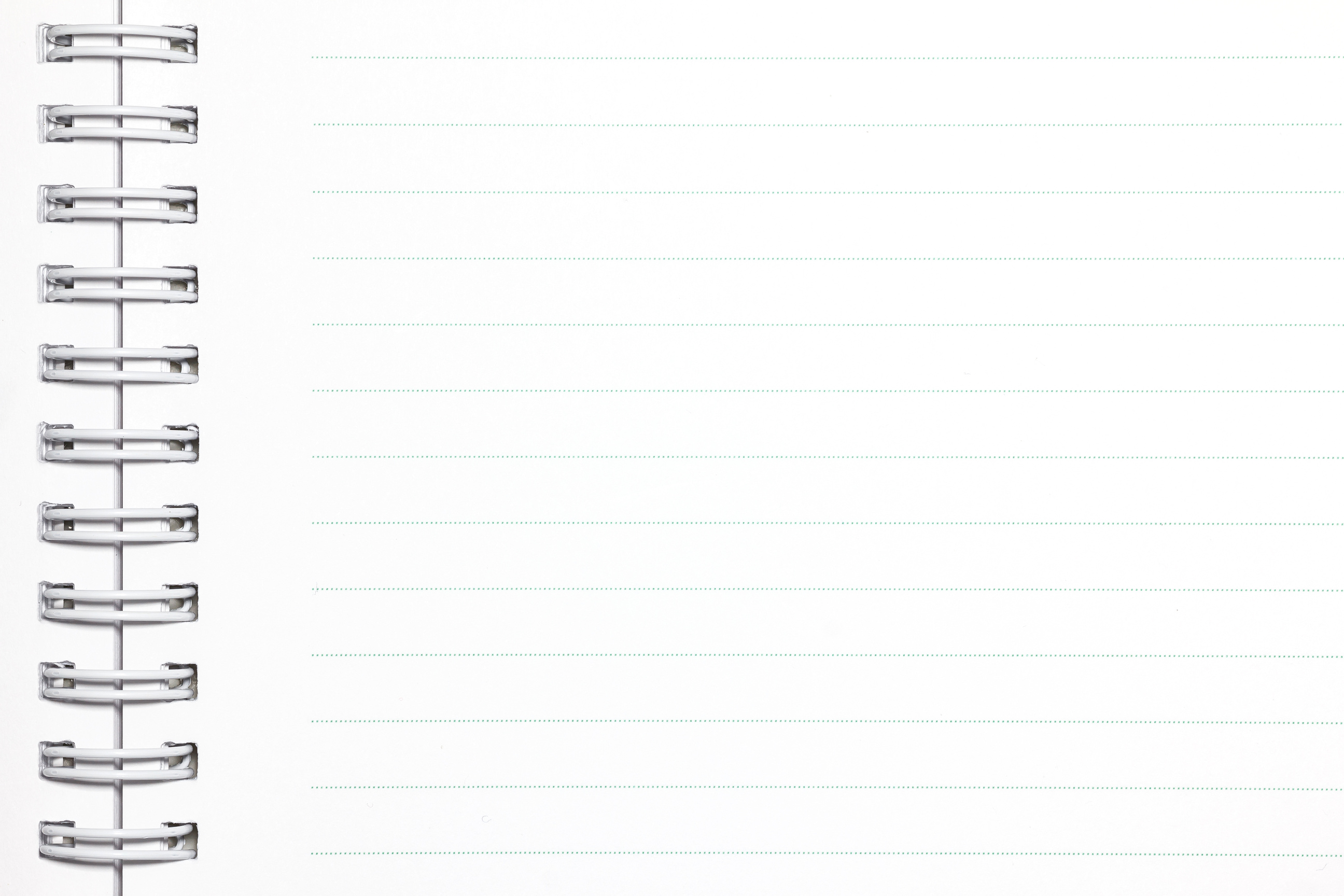 Notebook paper closeup. Blank paper spiral notebook page.